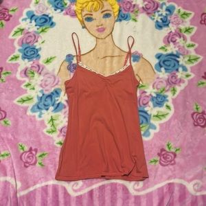 SO orange shirt with lace lining in the front